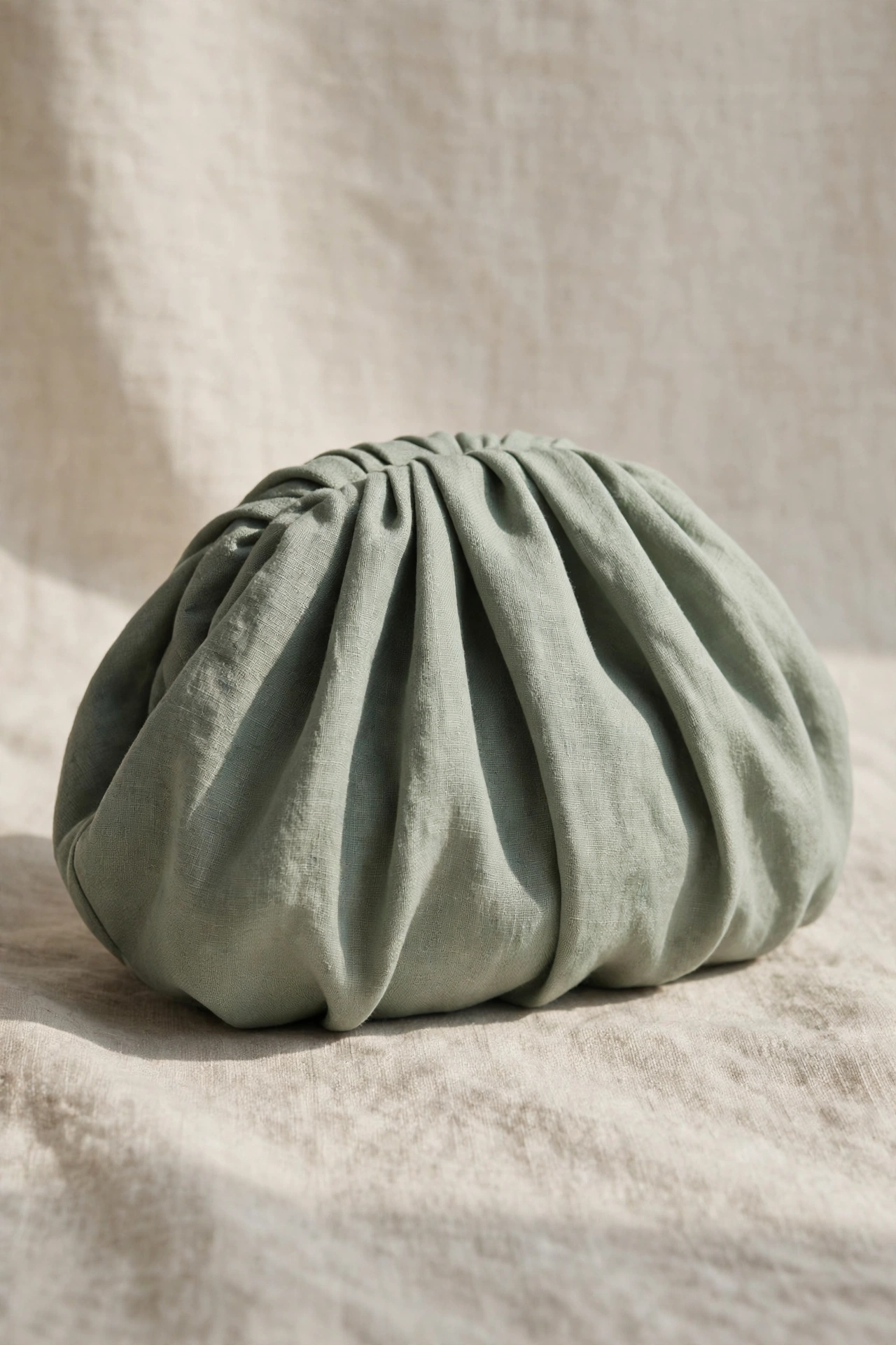 Pleated dumpling clutch in a different colour variation